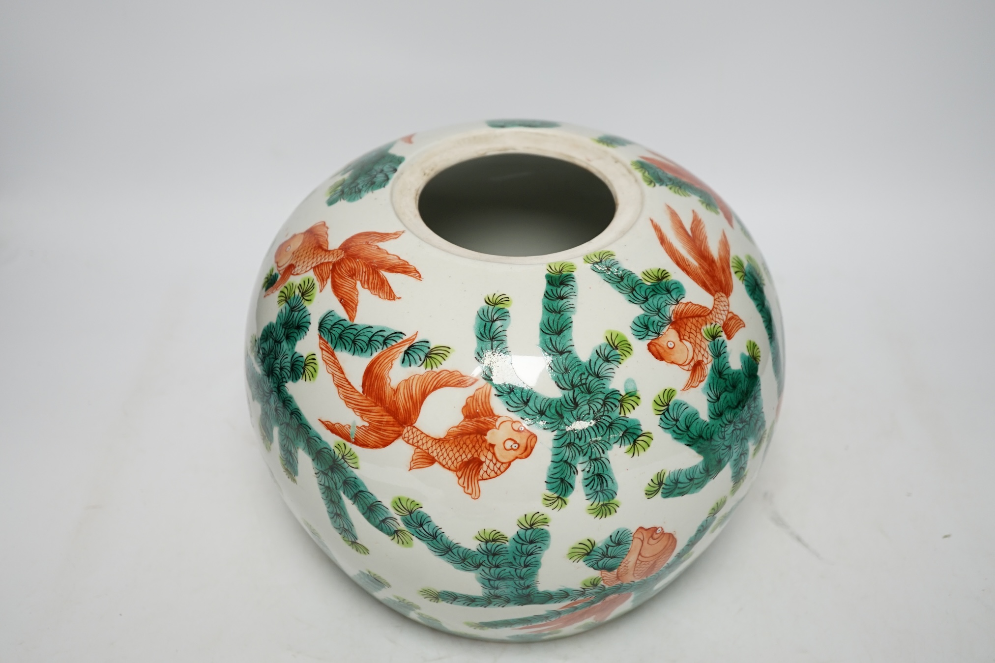 From the Studio of Fred Cuming. A Chinese famille verte goldfish jar and cover, 23cm high. Condition - good